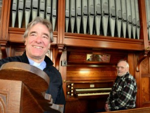 Tim Harmer, Vicar of St. Luke's Church with Roger Maillinson who restored the organ